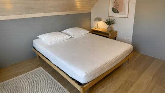 A comfortable bedroom featuring bedding protectors powered by HeiQ Allergen Tech™